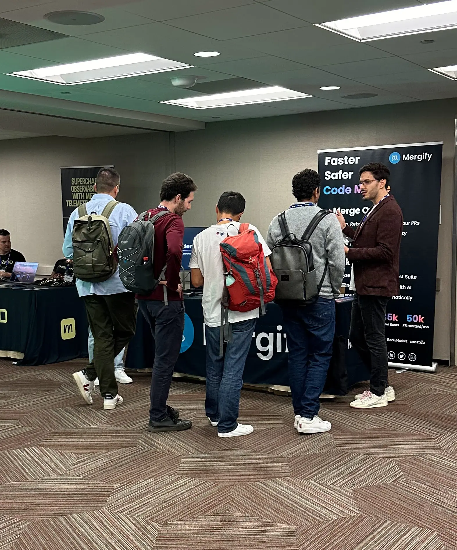 Mergify booth at QCon San Francisco 2023